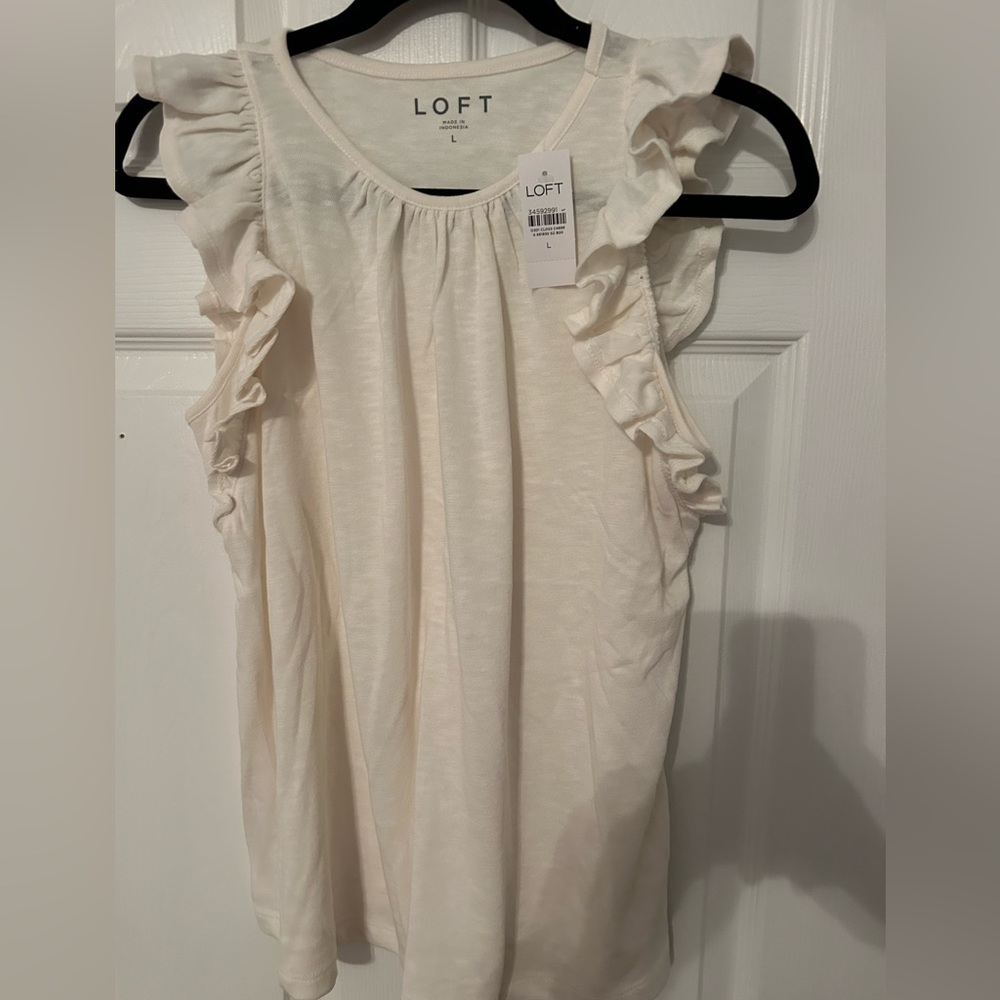 Cream loft shirt. Large